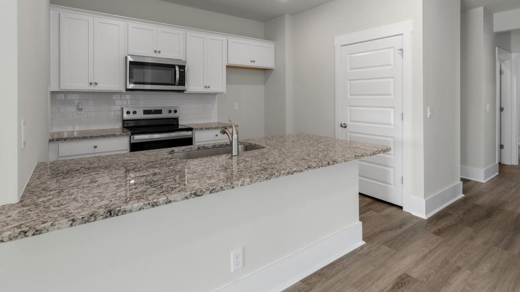 Furnished interior view inside a new home in Indigo Preserve Townhomes, Leland (Image 5).