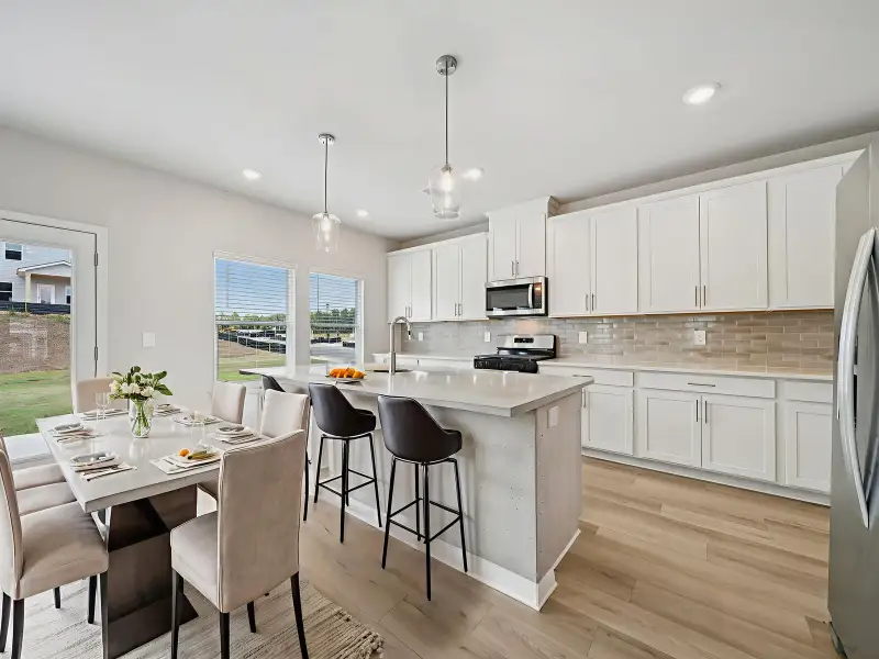 Furnished interior view inside a new home in Northwoods at Mirror Lake, Villa Rica (Image 4).