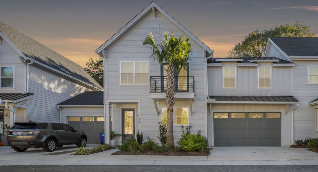 Front exterior of a new home in Hayes Park, Johns Island, SC, highlighting curb appeal (Image 1). Front exterior of a new home in Hayes Park, Johns Island, SC, highlighting curb appeal (Image 1).