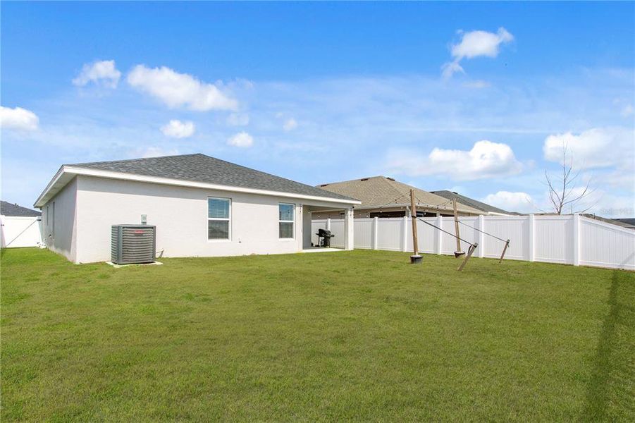 Exterior details and patio area of a home in , Zephyrhills (Image 23).