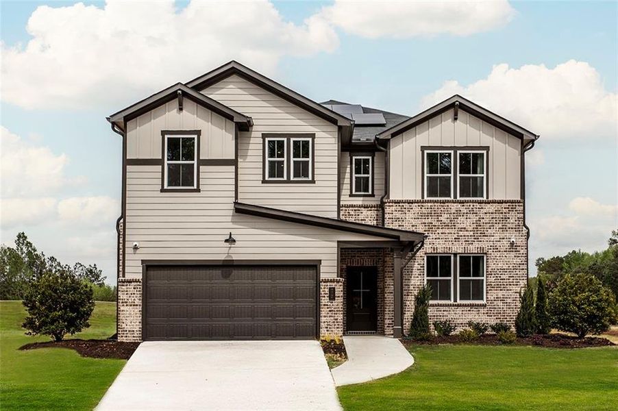 Front exterior of a new home in Easton Walk, Lawrenceville, GA, highlighting curb appeal (Image 2). Front exterior of a new home in Easton Walk, Lawrenceville, GA, highlighting curb appeal (Image 2).