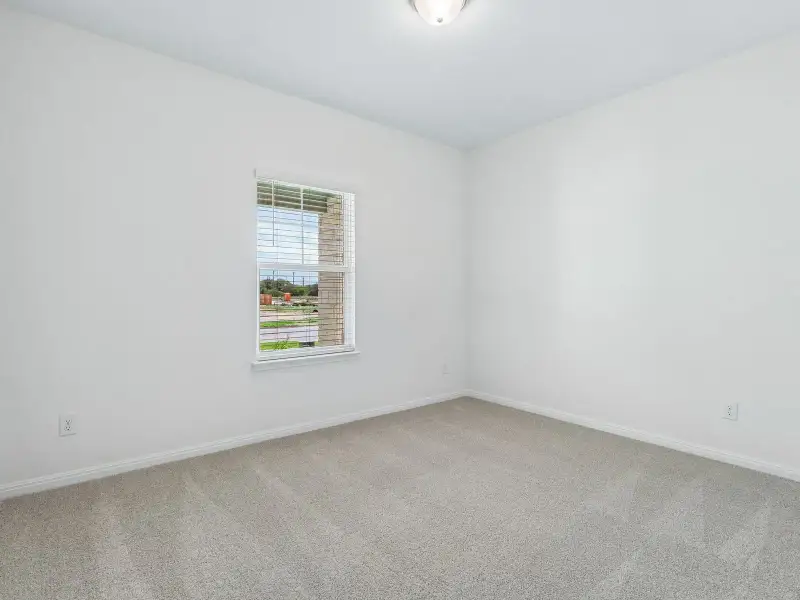 Spacious, unfurnished interior of a new home in Colony at Cole Springs - Boulevard Collection, Buda (Image 13).