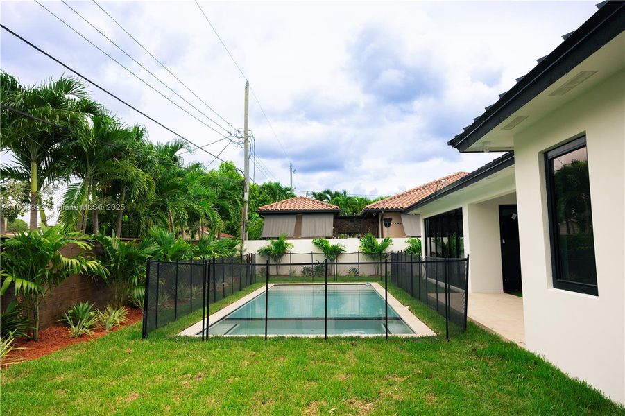 Front exterior of a new home in , Miami, FL, highlighting curb appeal (Image 22).