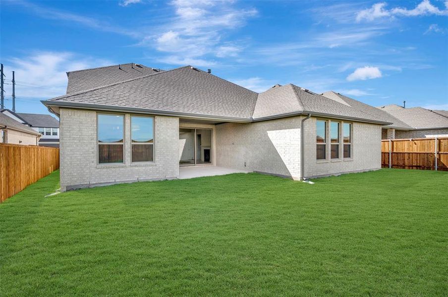 Exterior details and patio area of a home in Wellington, Haslet (Image 3).