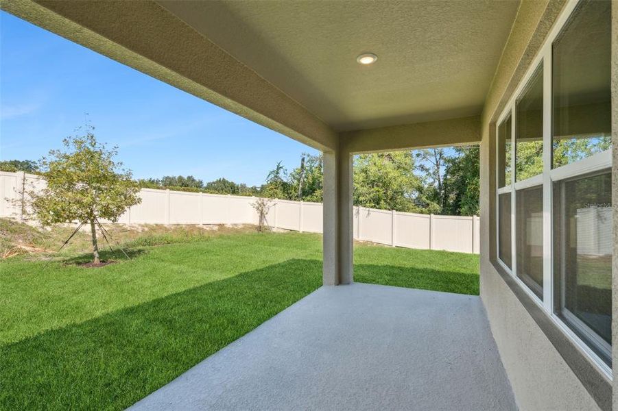 Exterior details and patio area of a home in , Ormond Beach (Image 2).