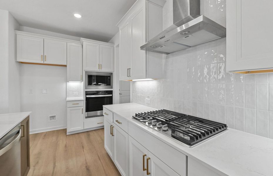 Furnished interior view inside a new home in Wolf Ranch, Georgetown (Image 16).