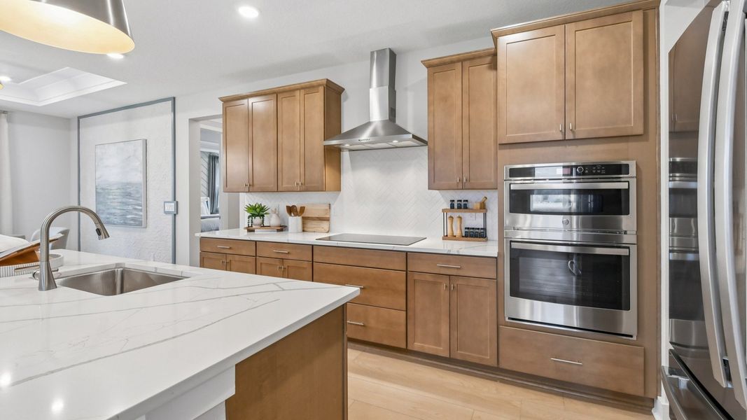 Kitchen in the Marigold Floor Plan at Haven at Diamond Springs