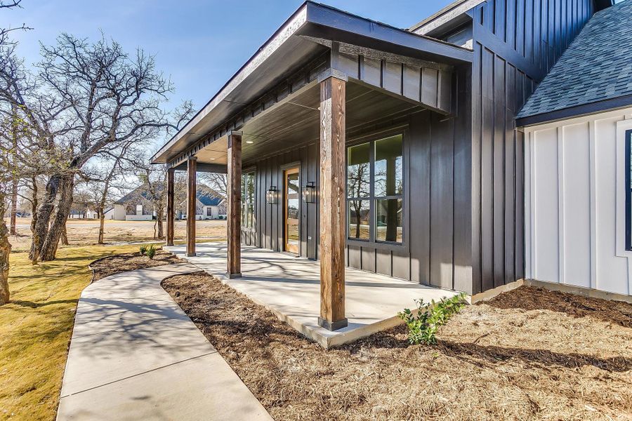 Representative exterior photo of a completed home built from the Erin by Trinity Classic Homes in The Reserve at Shadle, Poolville, TX (Image 27). Representative exterior photo of a completed home built from the Erin by Trinity Classic Homes in The Reserve at Shadle, Poolville, TX (Image 27).