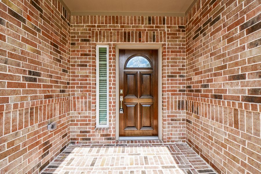 Exterior details and patio area of a home in , Houston (Image 4). Exterior details and patio area of a home in , Houston (Image 4).
