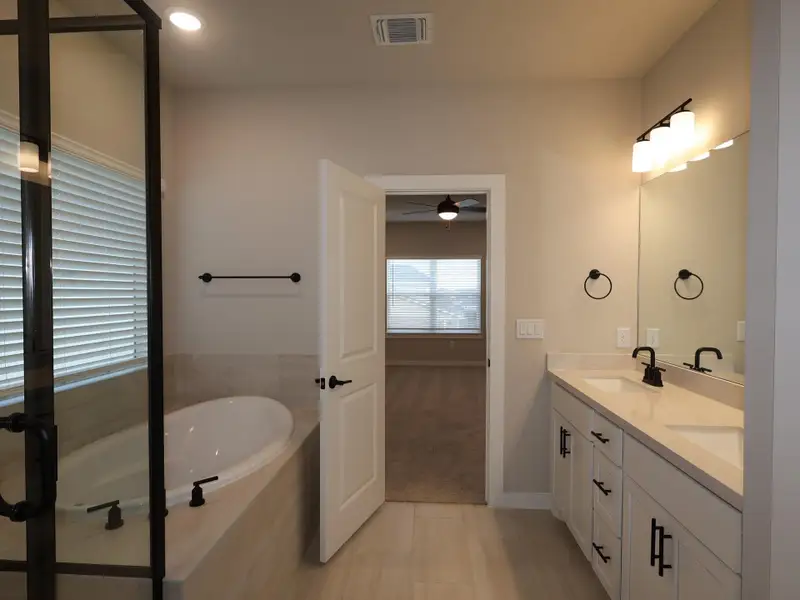 Furnished interior view inside a new home in Edgewood, Leander (Image 14). Furnished interior view inside a new home in Edgewood, Leander (Image 14).