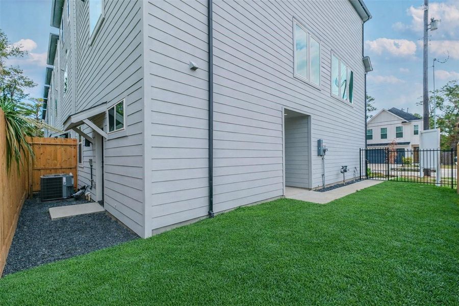 Exterior details and patio area of a home in , Houston (Image 3).