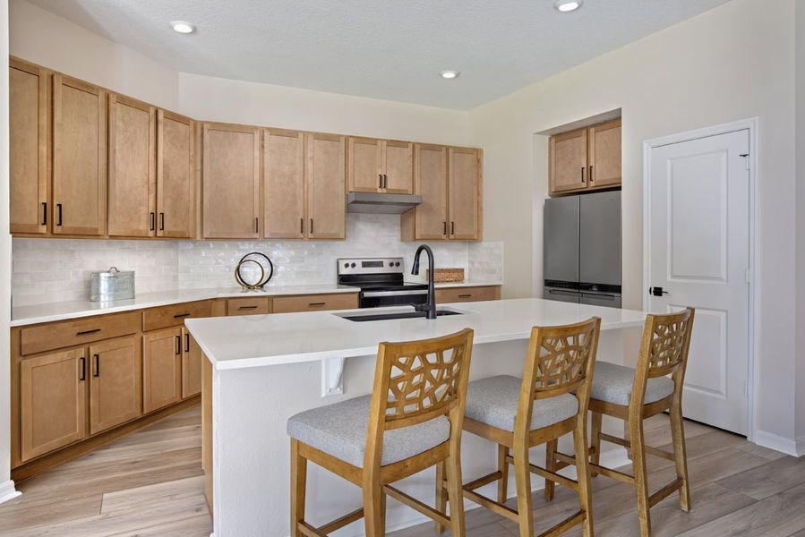 Representative furnished interior of a home built from the 1989 by KB Home in Canoe Creek Reserve III, St. Cloud (Image 3).