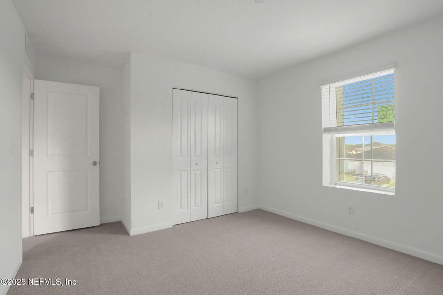 Spacious, unfurnished interior of a new home in Cordova Palms, St. Augustine (Image 31).