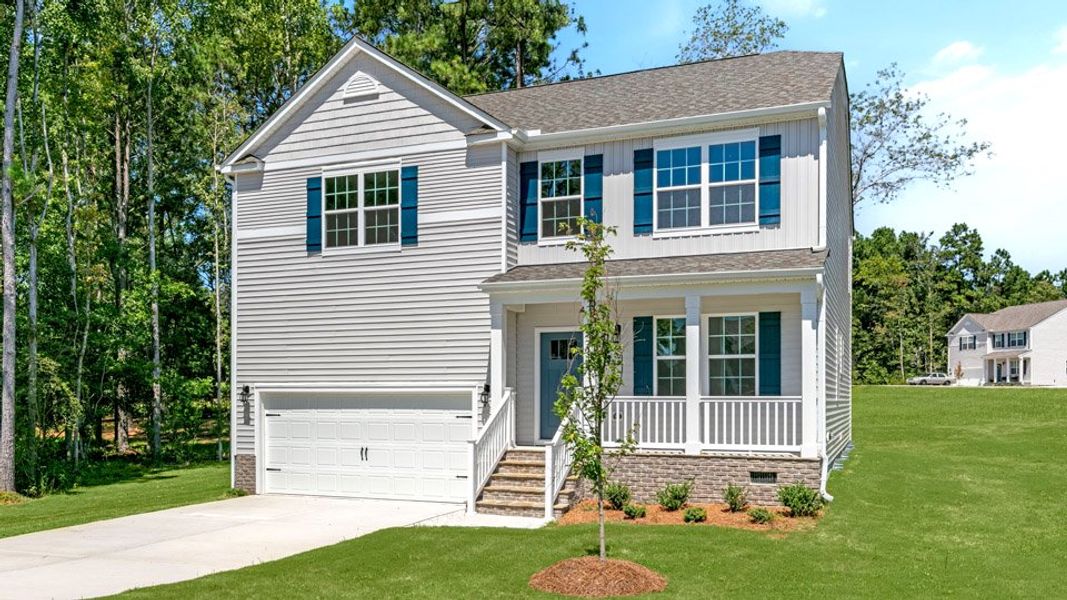 Representative exterior photo of a completed home built from the WILMINGTON by D.R. Horton in McKay Place, Lillington, NC (Image 21).