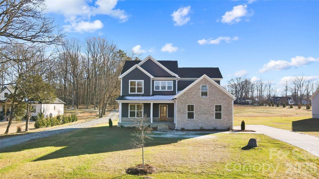 Front exterior of a new home in Lancaster Hwy, Waxhaw, NC, highlighting curb appeal (Image 29).