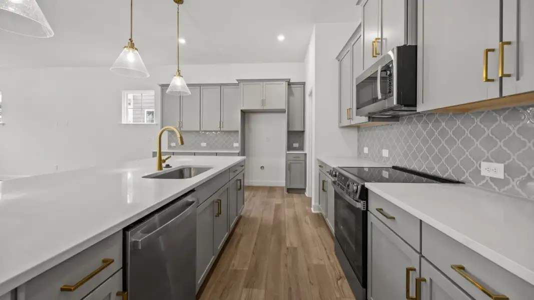 The Brentwood Plan by DRB Homes in River District, Charlotte NC.- Kitchen