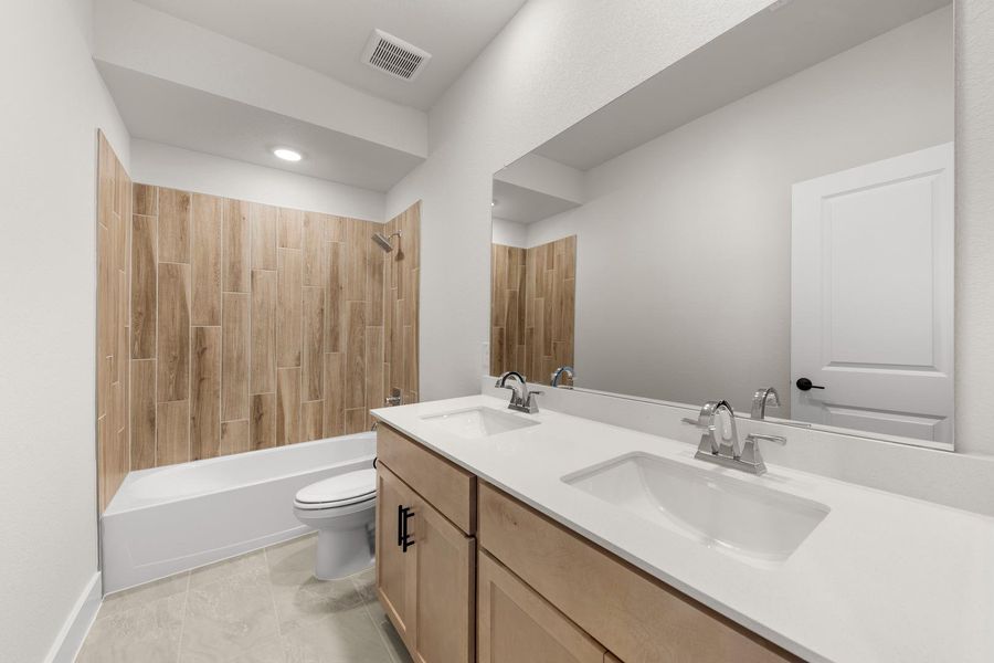 Furnished interior view inside a new home in Union Park, Little Elm (Image 13).