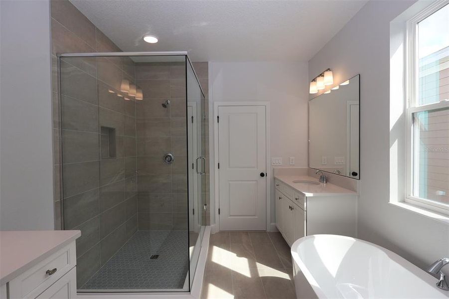 Furnished interior view inside a new home in Lake Star at Ovation, Winter Garden (Image 16).