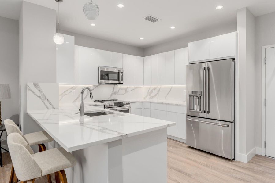 Furnished interior view inside a new home in , Stuart (Image 7). Furnished interior view inside a new home in , Stuart (Image 7).
