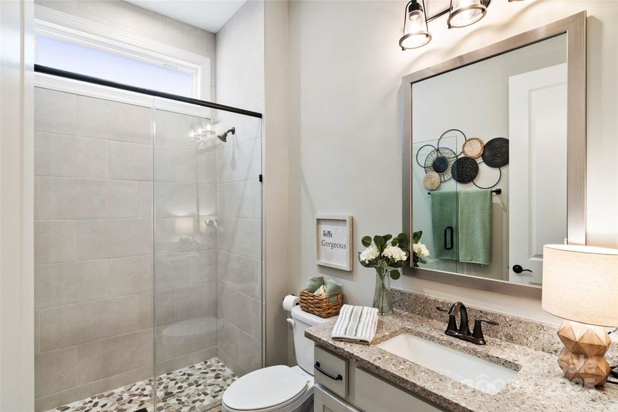 Side of home bedroom with ensuite bath Side of home bedroom with ensuite bath