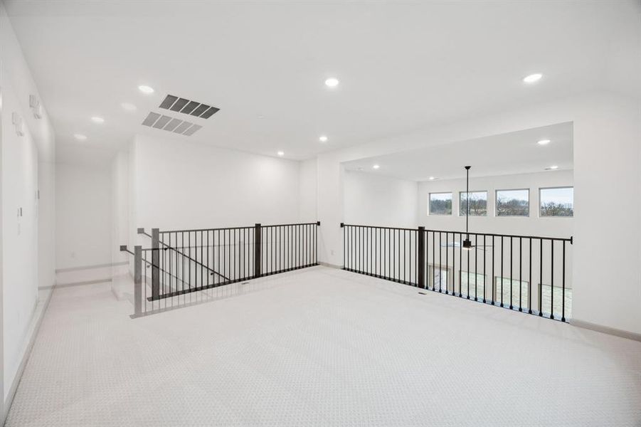 The entire family will enjoy plenty of fun times in this light filled, spacious game room!