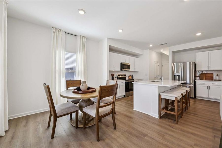 Furnished interior view inside a new home in Eastlyn Crossing, Flowery Branch (Image 7).