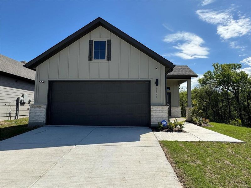 Front exterior of a new home in Lakehaven, Farmersville, TX, highlighting curb appeal (Image 2). Front exterior of a new home in Lakehaven, Farmersville, TX, highlighting curb appeal (Image 2).