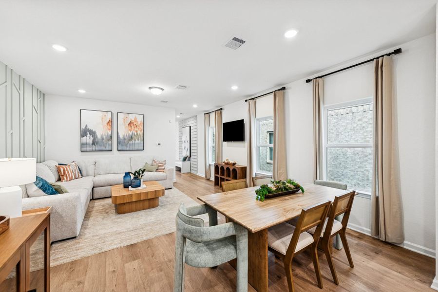 Dining Area into Family Room. Sample image for illustration; upgrades, options, and colors may vary.