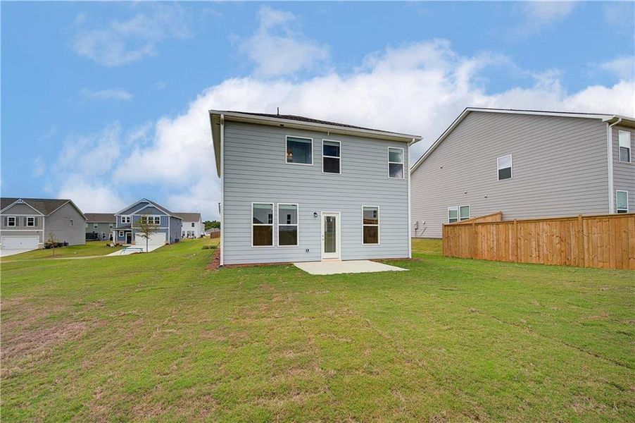 Exterior details and patio area of a home in Chapel Hill, Newnan (Image 17).