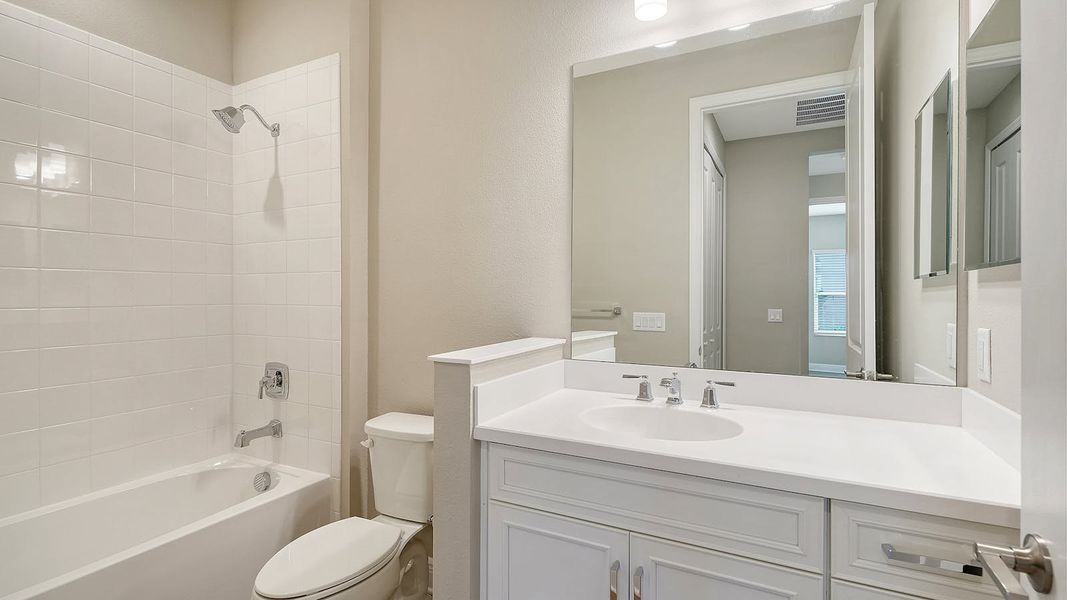 Furnished interior view inside a new home in Wildleaf Real Estate and Homes for Sale in Parrish, FL - Neal Communities, Parrish (Image 12).