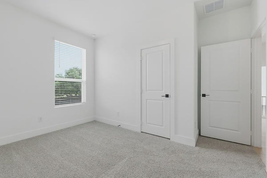 Spacious, unfurnished interior of a new home in Centero at Stone Oak, San Antonio (Image 20).