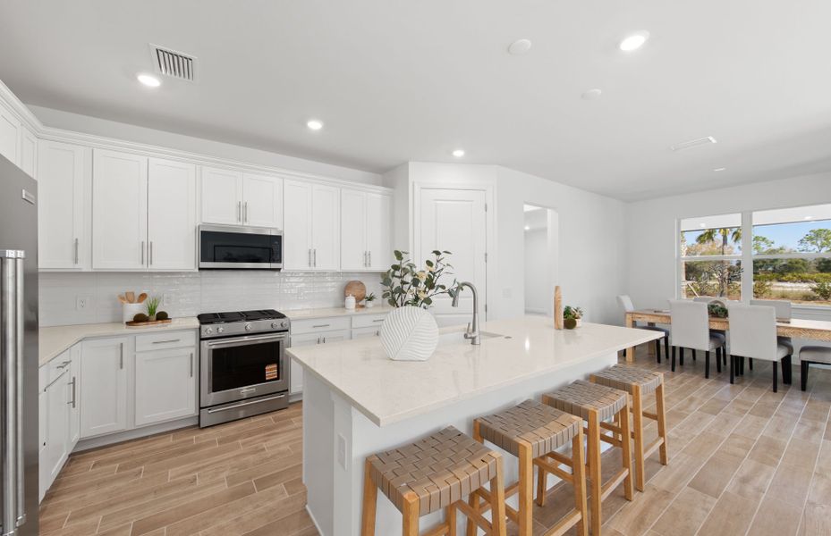 Furnished interior view inside a new home in TerraWalk at Babcock Ranch, Alva (Image 14).