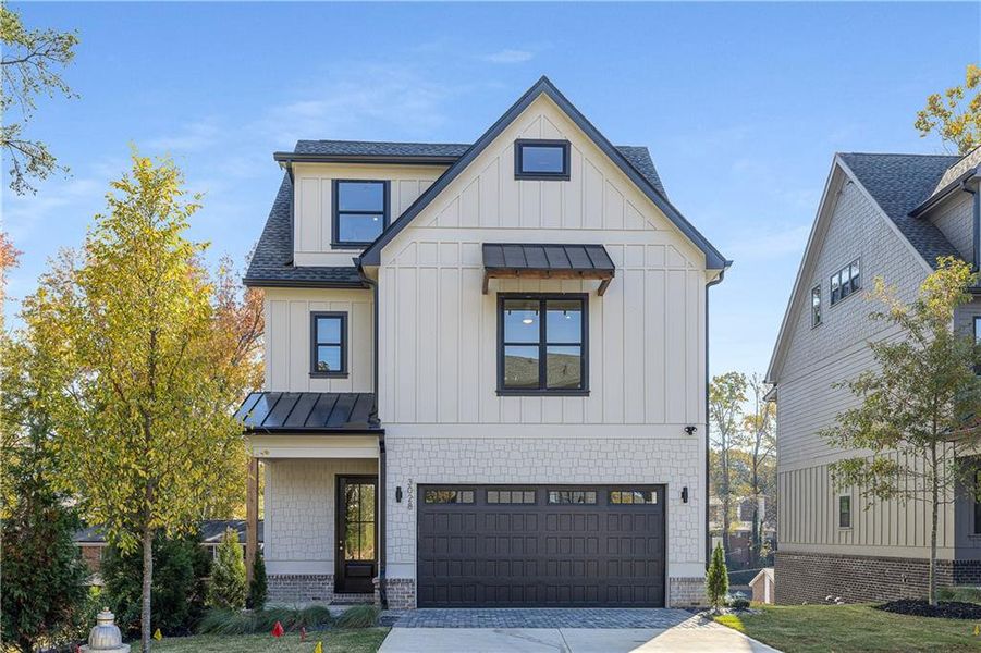 Front exterior of a new home in , Smyrna, GA, highlighting curb appeal (Image 1).