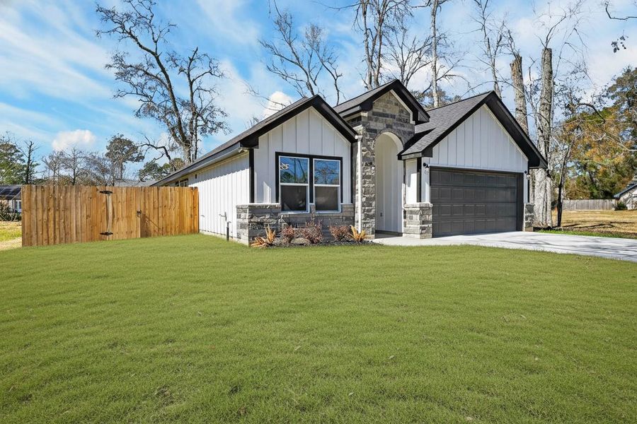 Front exterior of a new home in , Cleveland, TX, highlighting curb appeal (Image 21).