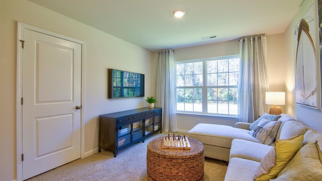 Furnished interior view inside a new home in Beaver Dam Crossing, Bailey (Image 33). Furnished interior view inside a new home in Beaver Dam Crossing, Bailey (Image 33).