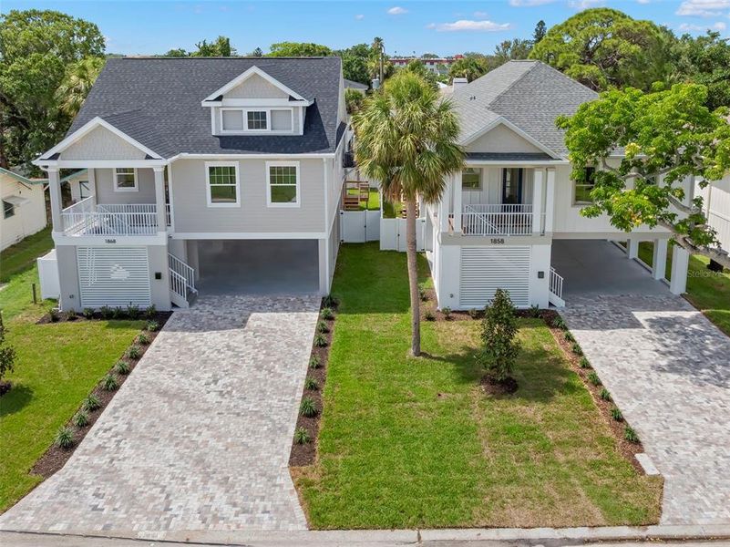 Front exterior of a new home in , St. Petersburg, FL, highlighting curb appeal (Image 22). Front exterior of a new home in , St. Petersburg, FL, highlighting curb appeal (Image 22).