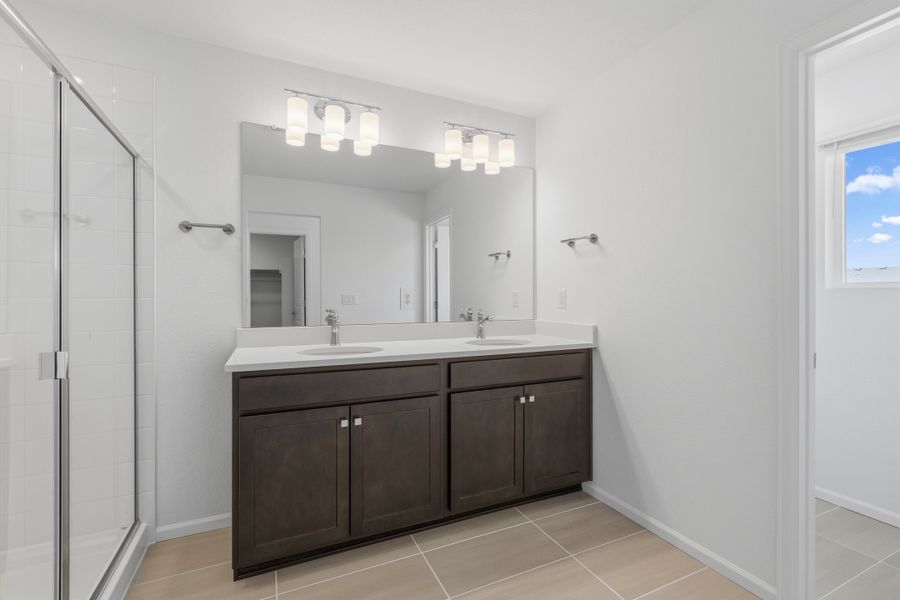 Furnished interior view inside a new home in Woodrose at Painted Prairie, Aurora (Image 7).