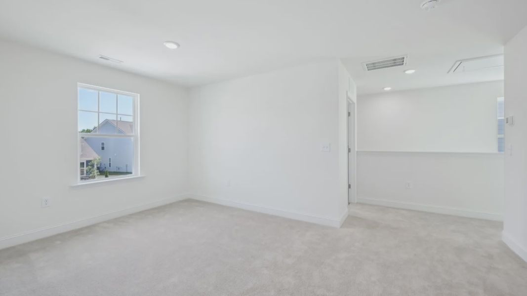 Furnished interior view inside a new home in Sidney Creek Single Family, Zebulon (Image 22).