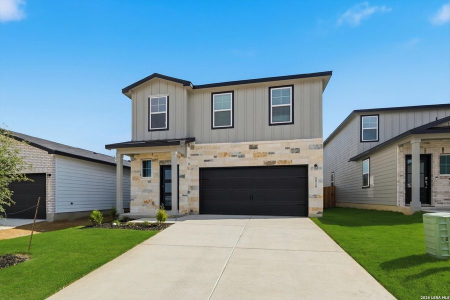 Front exterior of a new home in Agave, San Antonio, TX, highlighting curb appeal (Image 1). Front exterior of a new home in Agave, San Antonio, TX, highlighting curb appeal (Image 1).
