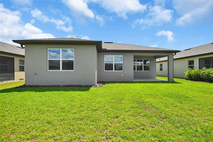Exterior details and patio area of a home in , Ocala (Image 25).