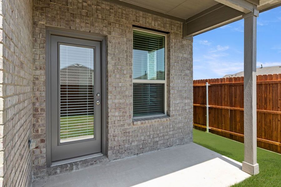 Front exterior of a new home in Northspur, Terrell, TX, highlighting curb appeal (Image 23). Front exterior of a new home in Northspur, Terrell, TX, highlighting curb appeal (Image 23).