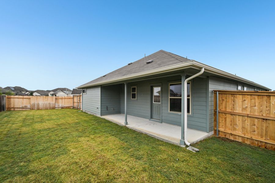 Exterior details and patio area of a home in Crosswinds, Kyle (Image 16).