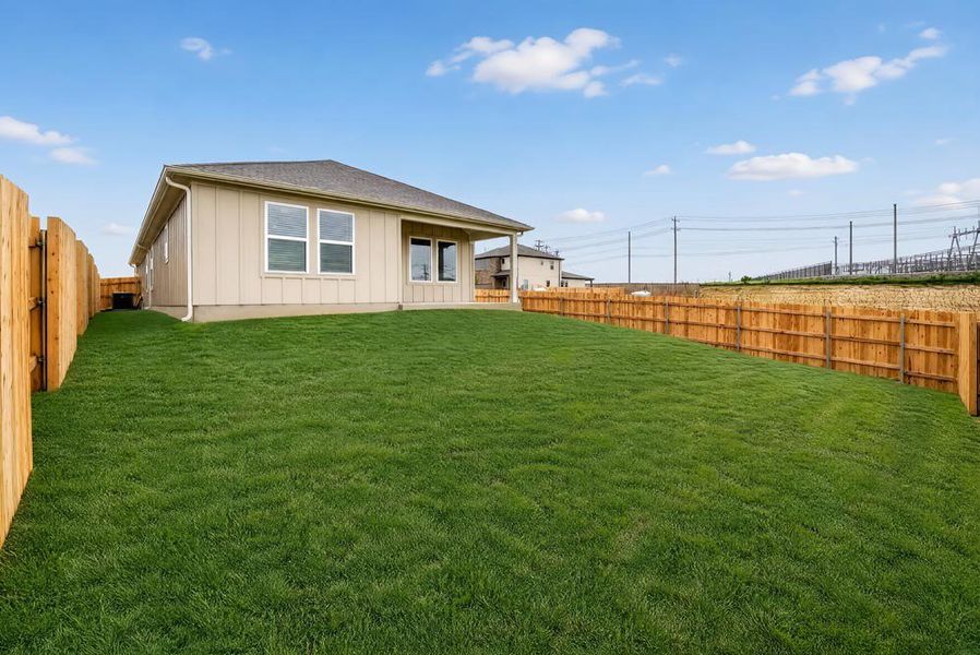 Exterior details and patio area of a home in Sunfield, Buda (Image 16).