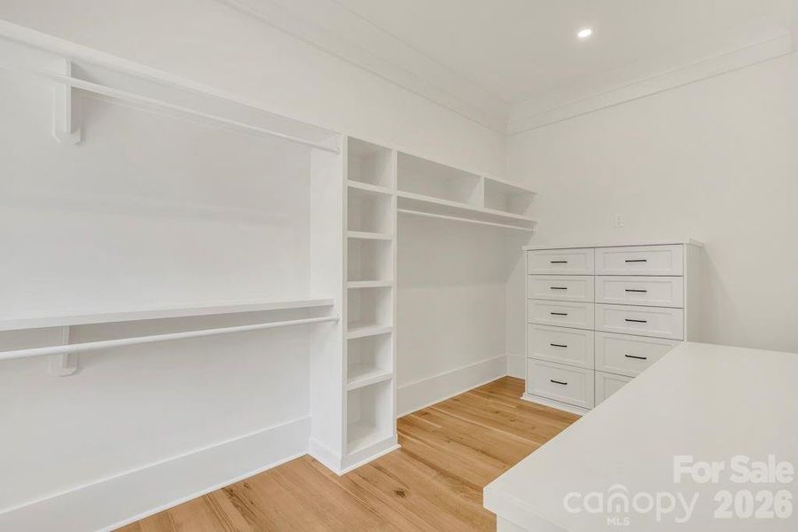Primary Suite SPACIOUS walk-in closet Primary Suite SPACIOUS walk-in closet