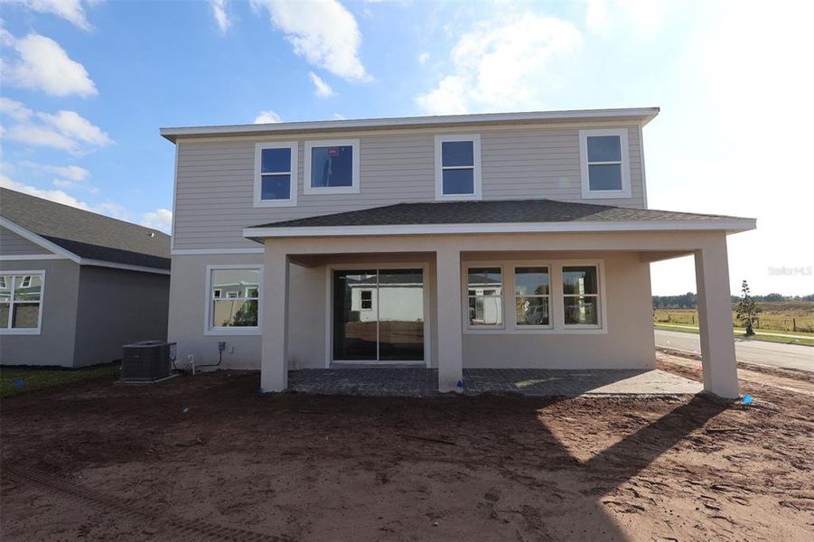 Exterior details and patio area of a home in Center Lake on the Park, St. Cloud (Image 2).