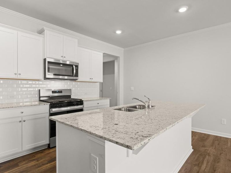 Furnished interior view inside a new home in Northwoods at Mirror Lake, Villa Rica (Image 3).