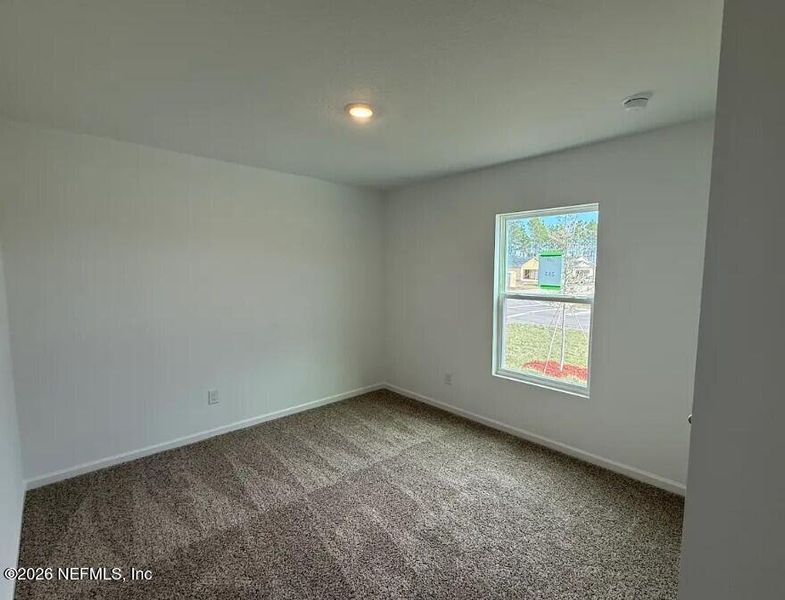 Spacious, unfurnished interior of a new home in Sawmill Branch, Palm Coast (Image 21).