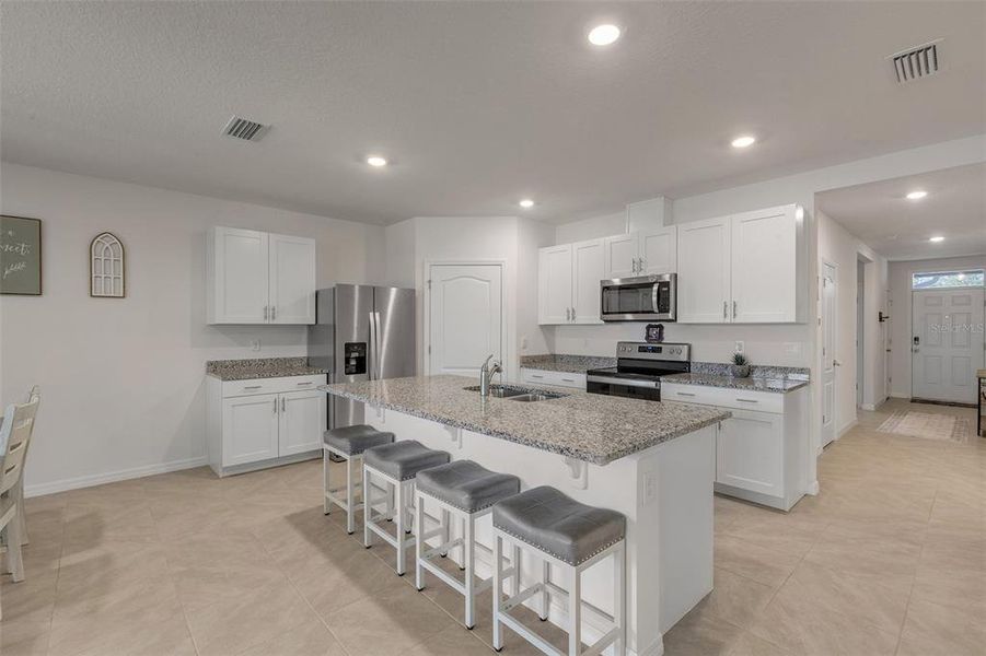Furnished interior view inside a new home in Groveside at Ormond Station, Ormond Beach (Image 11).