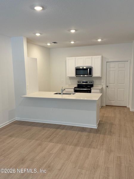 Furnished interior view inside a new home in Liberty Cove, Yulee (Image 9).