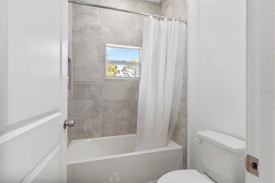 Furnished interior view inside a new home in , Port Charlotte (Image 30).